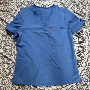 Like new condition figs scrub top.